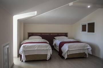 Фото номера Семейный номер с ванной комнатой Гостевой дом Stone Art Guest House &amp; Camping г. Pemzashen 5
